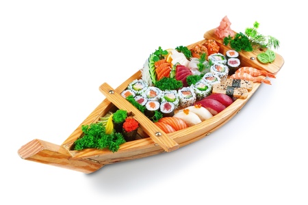 Collection of species sushi on the decorative plate ship. On a white background.の写真素材