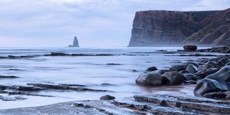 Beautiful seascape of rocks and sea at sunset  Stone Needle の写真素材