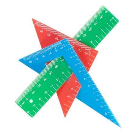 School tools multicolored triangle, ruler, protractor. Close-up.