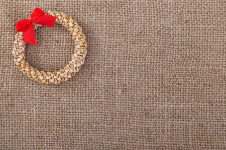 Decorative wreath straw sacking symbol of New Year and Christmas.の写真素材