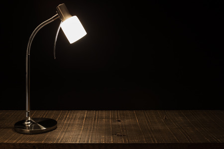 Lamp Shade on the table. In a dark background.の写真素材