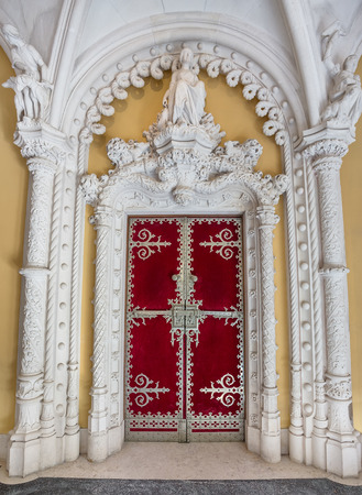 Very ancient castle door facade Regaleira. Beautiful frescoes history.のeditorial素材