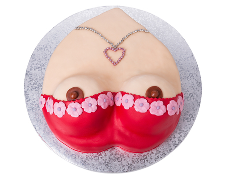 The original cake for men in the form of a female breast. Close-up, on the day of birth.の写真素材