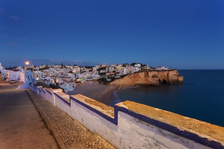 Evening over the village of Carvoeiro. View from the top the sea beaches.の写真素材