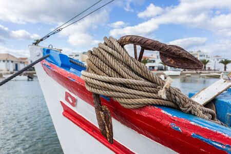Typical old portuguese fishing boat on the beach of Espinho, Portugalの写真素材
