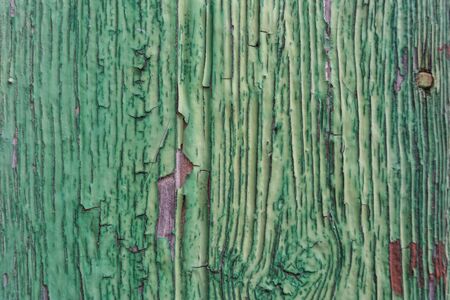 Cracked wooden ancient texture green. Close upの写真素材