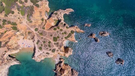 Aerial. View from the sky of the mountain capes on shores of Portimao.の写真素材