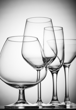 A variety of empty glasses for alcoholic beverages.の写真素材