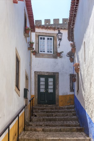 The ancient streets and houses of Portuguese village of Obidos.の写真素材