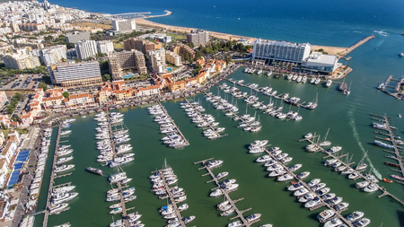 Aerial view of the bay of the marina, with luxury yachts in Vilamoura.の写真素材