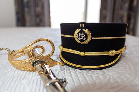 Traditional portuguese policeman uniform GNR. Cap and swordの写真素材