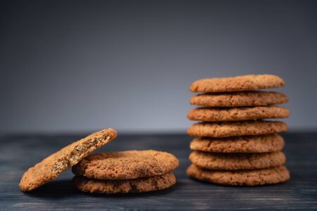 Homemade oatmeal cookies on a wooden background. Great healthy breakfast