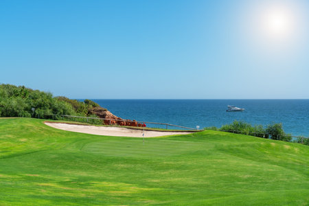 Resort luxury beaches, golf courses with palm trees, overlooking the sea for tourists to relax. High quality photoの写真素材