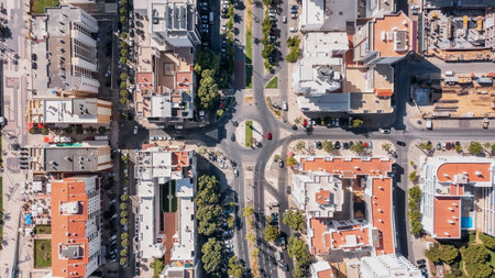 Aerial cityscape of houses and streets of Portugal cities. View from above. Quarteira. High quality photoの写真素材