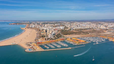 Aerial view of the panorama of the sea bay of Portimao, marinas with luxury yachts. Passing ships with tourists. High quality photoの写真素材