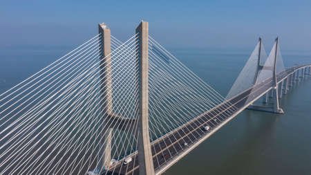 Aerial view of the most beautiful Portuguese bridge in Lisbon, Vasco da Gama. Morning foggy...