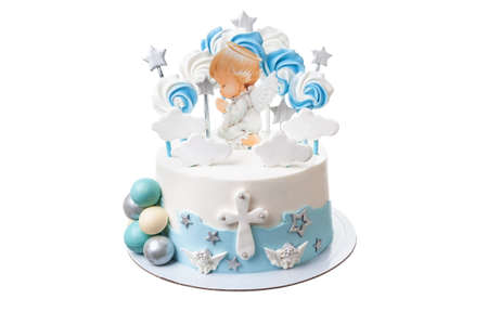 Decorative delicious cake for the baptism of a baby in the form of a praying angel. On white isolated background. High quality photoの写真素材