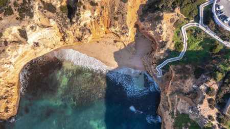 Aerial view of sea harbor bay with footpath to beach and sea. On a sunny day.の写真素材