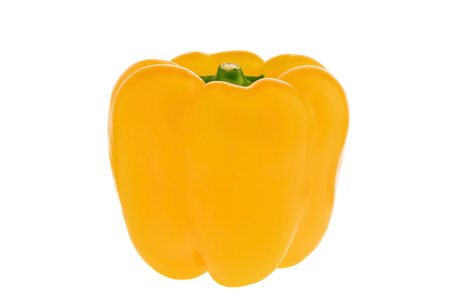 Raw vegetable bright yellow peppers on a white isolated background for vegetarian dishes.の写真素材