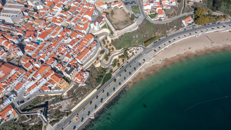 Aerial panorama of city of Sines, Setubal Alentejo Portugal Europe. Aerial view of old town fishing port, historic center and castle and beach.の写真素材