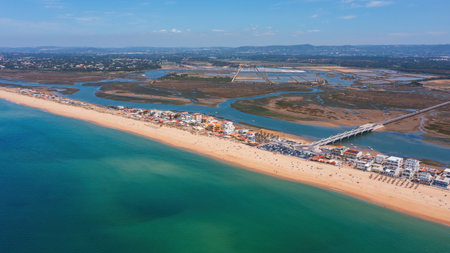 salt lakes, industry, Castro Marim, Portugal, aerial, Coastal scenic panorama, Magnificent coastal scene with turquoise waters and golden sands, Skyward overlookingの写真素材
