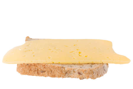 sandwich for breakfast: cheese on a piece of bread isolated on a white backgroundの写真素材