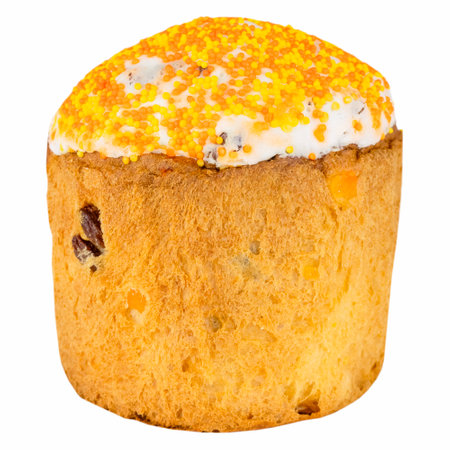 Rich Easter cake with raisins, covered with icing and colored sprinklesの写真素材