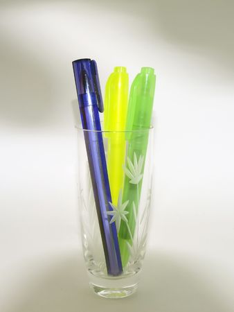 Color pen with glass on the abstract backgroundの写真素材