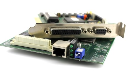 Two old peripheral controller cards for computer. Shallow DOF.