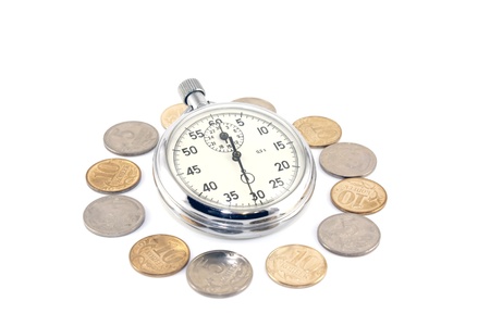 Stop-watch and coin over whiteの写真素材