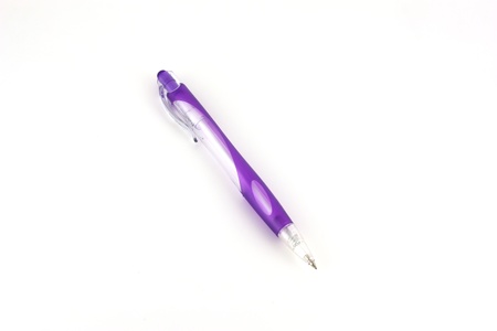 Violet ball-point pen over whiteの写真素材