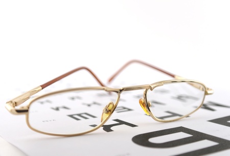 Eyeglasses on the ophthalmologic scale. Shallow DOF.の写真素材