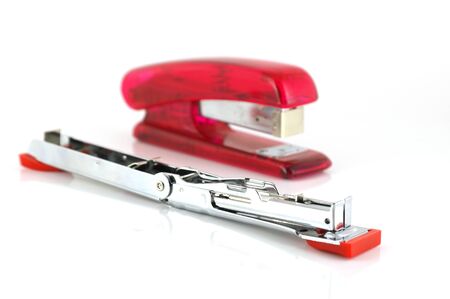 Two staplers over whiteの写真素材