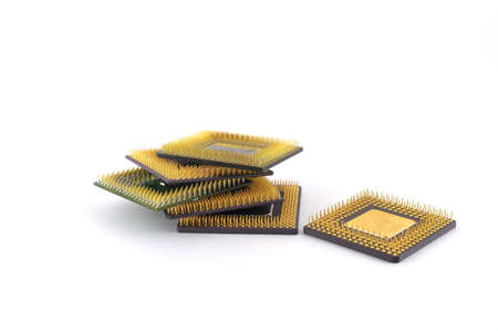 Six microprocessors over white. Shallow DOF.の写真素材