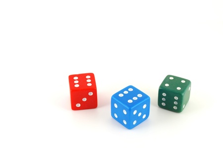Three color dice over whiteの写真素材