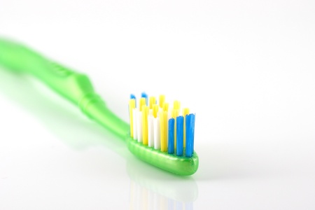 Tooth-brush over white. Shallow DOFの写真素材