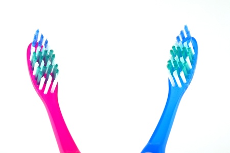 Two tooth-brushes over whiteの写真素材