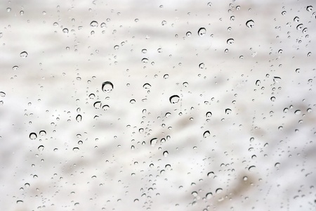 Drops of rain on the window (glass). Shallow DOF.の写真素材