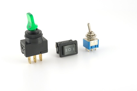 Electrical switches over whiteの写真素材