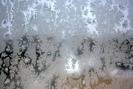 Abstract texture, pattern frost on the window, view macroの写真素材