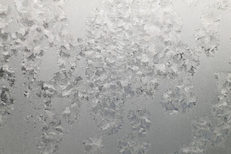 Abstract texture, pattern frost on the window, view macro. Shallow dofの写真素材