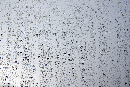 Drops of rain on the window (glass). Shallow DOF.の写真素材