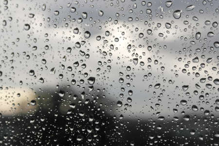 Drops of rain on the window (glass). Shallow DOF.の写真素材