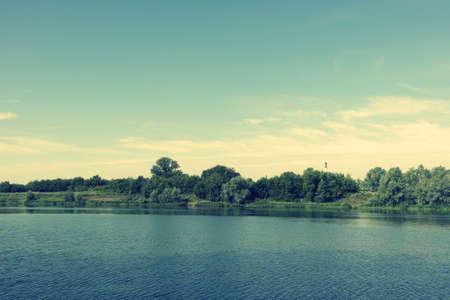 Beautiful summer landscape with riverの写真素材
