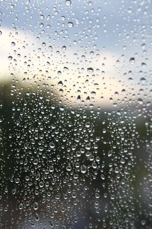 Drops of rain on the window (glass). Shallow DOF.の写真素材