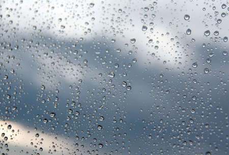 Drops of rain on the window (glass). Shallow DOF.の写真素材