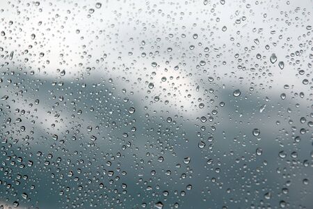 Drops of rain on the window (glass). Shallow DOF.の写真素材