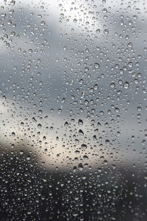 Drops of rain on the window (glass). Shallow DOF.の写真素材