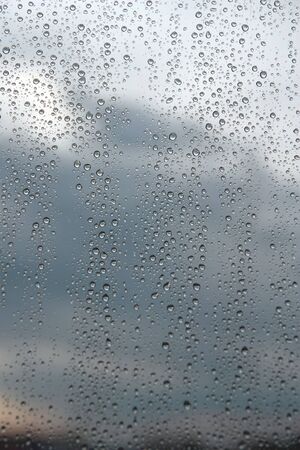 Drops of rain on the window (glass). Shallow DOF.の写真素材