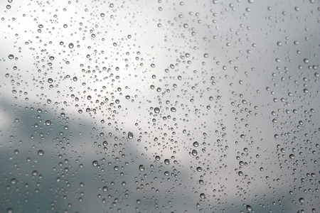 Drops of rain on the window (glass). Shallow DOF.の写真素材